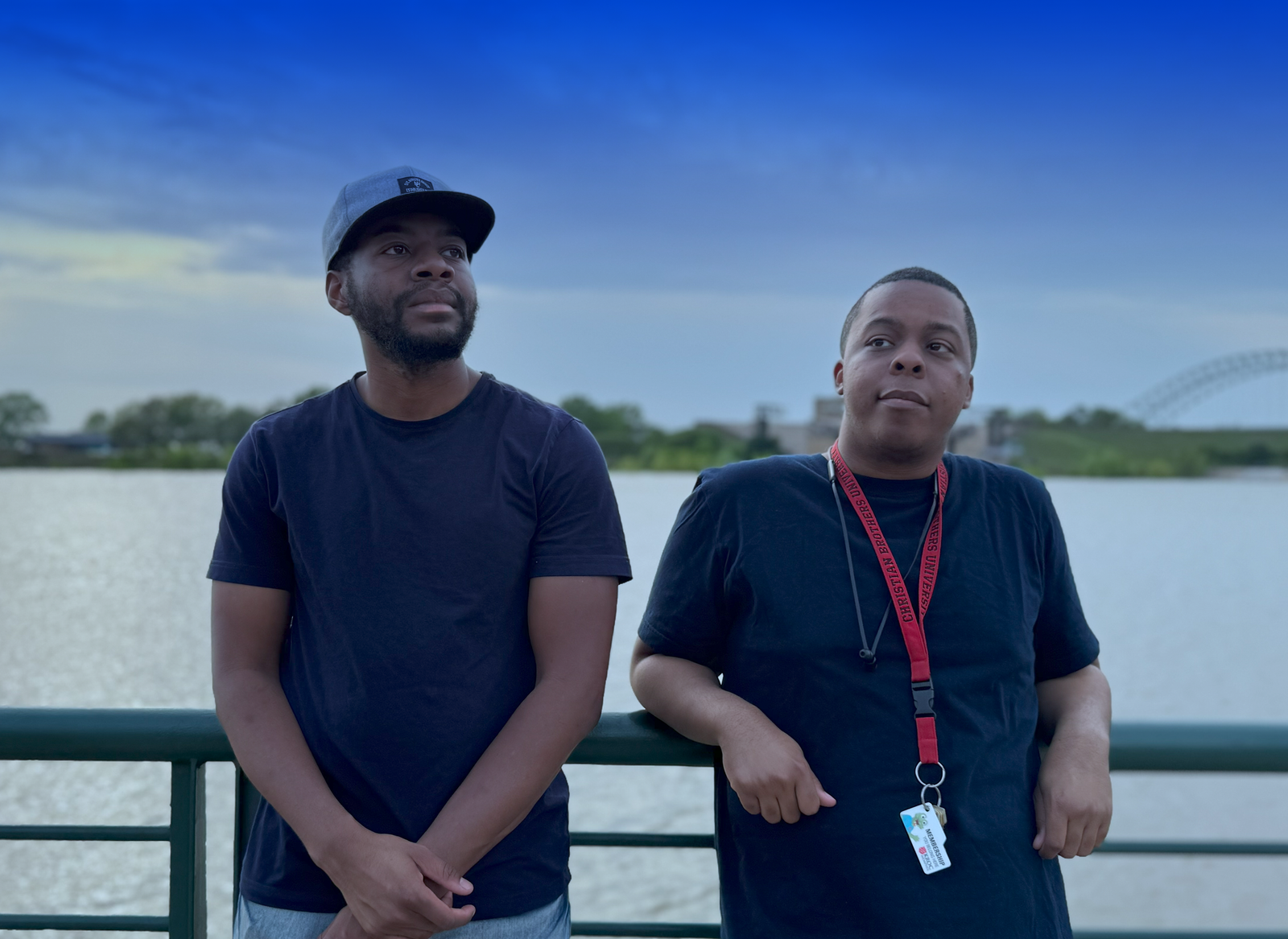 Fusion Design Studio's two co-founders by the river